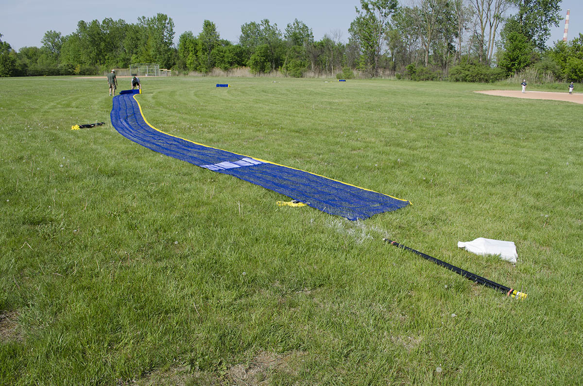 Blue Grand Slam fence is layed out at Lions Park in Trenton, Michigan.